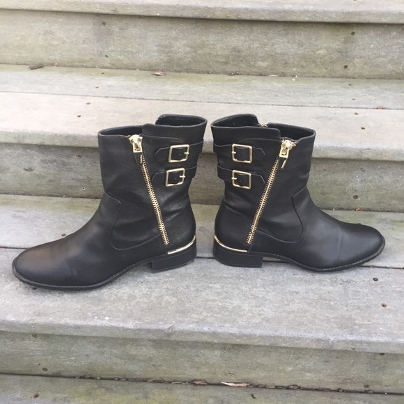 calvin klein black boots with gold zipper